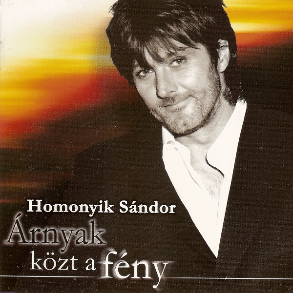 Homonyik Sándor - Árnyak közt a fény (2001).jpg